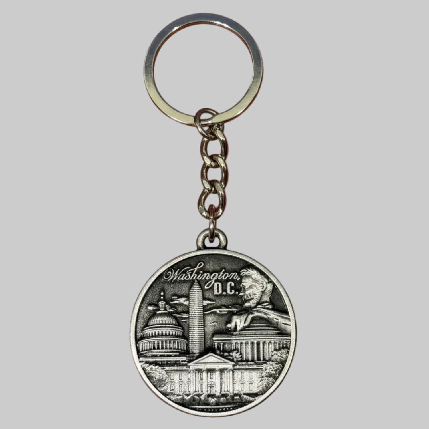 Keychain with a design of Washington D.C. on a gray background
