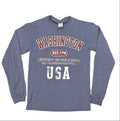 Blue long-sleeve shirt with 'Washington USA' text on a black table.